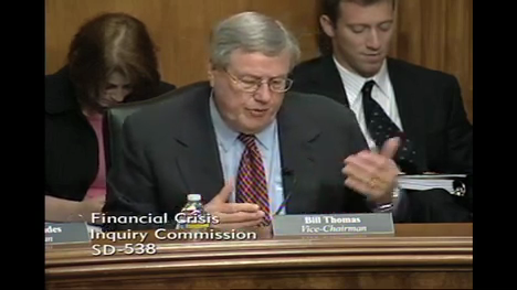 A frame of FCIC vice-chairman Bill Thomas speaking at the hearing table, shown at its native 468 by 263 pixel size.